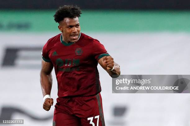 Wolverhampton Wanderers' Spanish midfielder Adama Traore celebrates after scoring their late winner during the English Premier League football match...