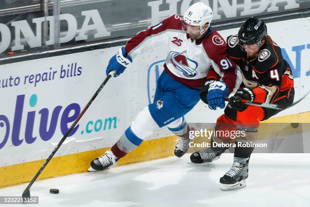 Nazem Kadri of the Colorado Avalanche skates with the puck ahead of Cam Fowler of the Anaheim Ducks in the third period at Honda Center on April 09,...