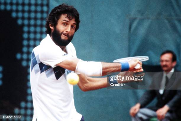 Spanish tennis player José Higueras returns ball during a match of the Roland Garros 1983 French Open tennis tournament in Paris, in May 1983.