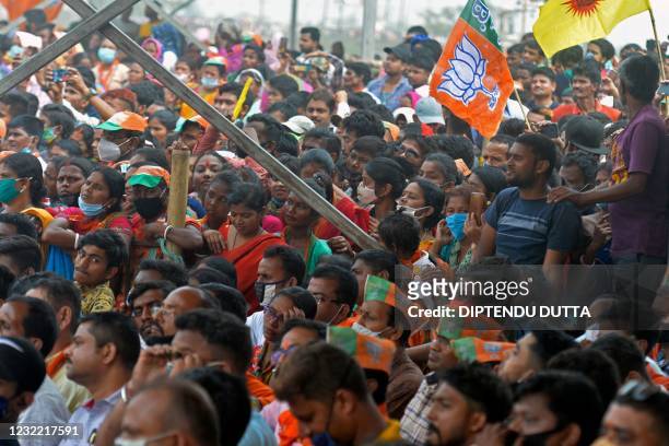 Supporters of Bharatiya Janata Party attend a public rally being addressed by Indian Prime Minister Narendra Modi during the ongoing fourth phase of...