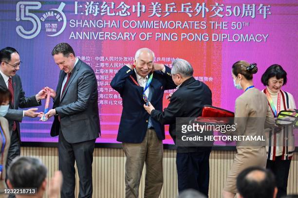Consul General in Shanghai James Heller with former Chinese table tennis players and "Ping-pong diplomacy" participants Zhang Xielin and Zheng Minzhi...