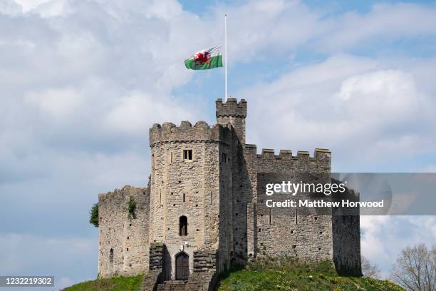 Wales flag flies at half mast at Cardiff Castle following a Death Gun Salute to mark the death of Prince Philip, Duke of Edinburgh on April 10, 2021...