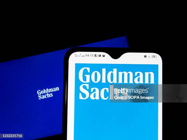 In this photo illustration Goldman Sachs Group, Inc. Logo seen displayed on a smartphone.