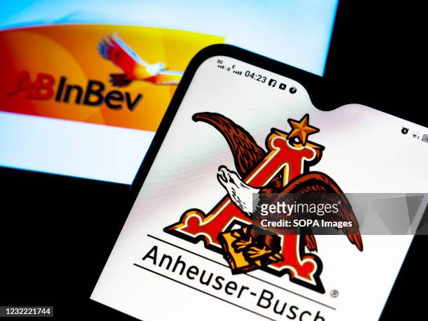In this photo illustration Anheuser-Busch InBev logo seen displayed on a smartphone.