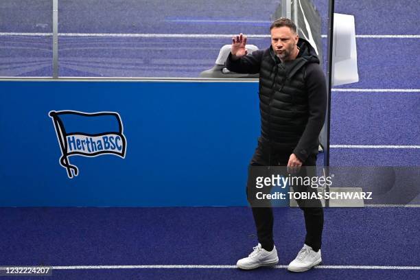 Hertha Berlin's Hungarian head coach Pal Dardai waves after the German first division Bundesliga football match between Hertha BSC Berlin and...