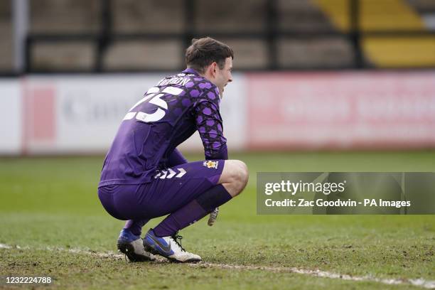 Cambridge United's Callum Burton looks dejected after the Sky Bet League Two match at the Abbey Stadium, Cambridge. Picture date: Saturday April 10,...