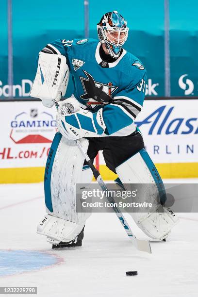 San Jose Sharks goaltender Martin Jones plays the puck during the San Jose Sharks game versus the Los Angeles Kings on April 9 at SAP Center at San...