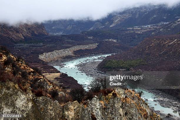 This photo taken on March 28, 2021 shows the Yarlung Zangbo Grand Canyon in Nyingchi city, in China's western Tibet Autonomous Region. China is...