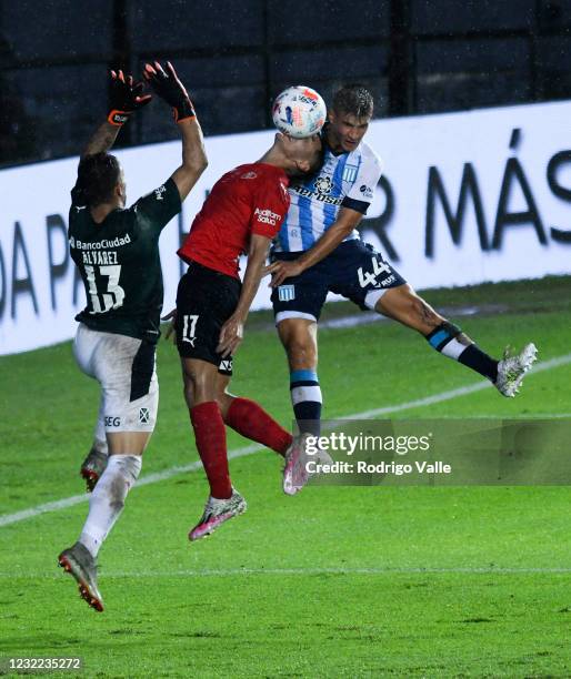 Ivan Maggi of Racing Club fights for the ball with Milton Alvarez and  News Photo - Getty Images
