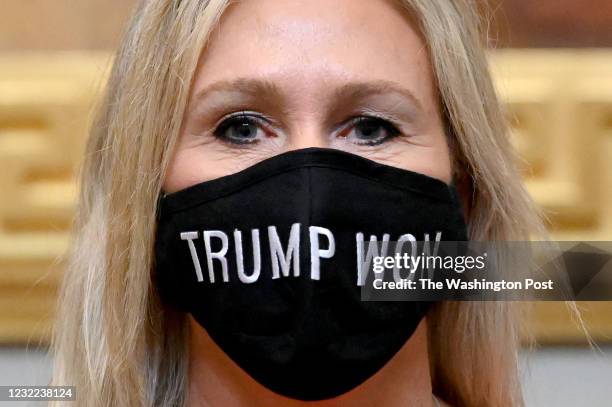 Anon supporter Marjorie Taylor Greene sports a Trump Won mask at the U.S. Capitol on the first day of the new Congressional session January 03, 2021...