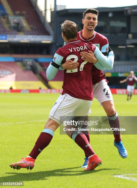 Matej Vydra of Burnley celebrates scoring the opening goal with Matthew Lowton during the Premier League match between Burnley and Newcastle United...
