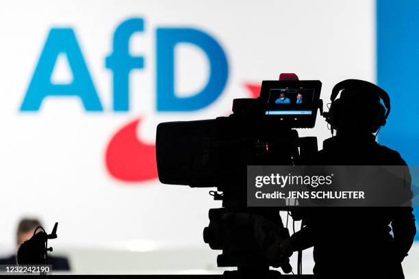 Cameraman works on the second day of the congress of far-right Alternative for Germany party in Dresden, eastern Germany, on April 11, 2021. - The...