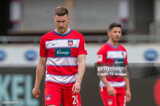 Christian Kuehlwetter of 1.FC Heidenheim 1846 and Kevin Sessa of 1.FC Heidenheim 1846 battle for the ball during the Second Bundesliga match between...