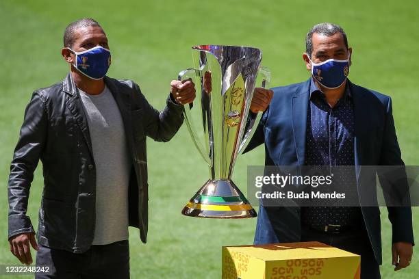Retired players Djalminha and Zinho hold the Supercopa do Brasil 2021 champions trophy prior to the match between Flamengo and Palmeiras at the Mane...