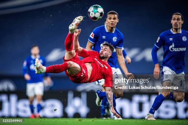 Marco Richter of Augsburg with a bicycle kick during the Bundesliga match between FC Schalke 04 and FC Augsburg at Veltins-Arena on April 11, 2021 in...