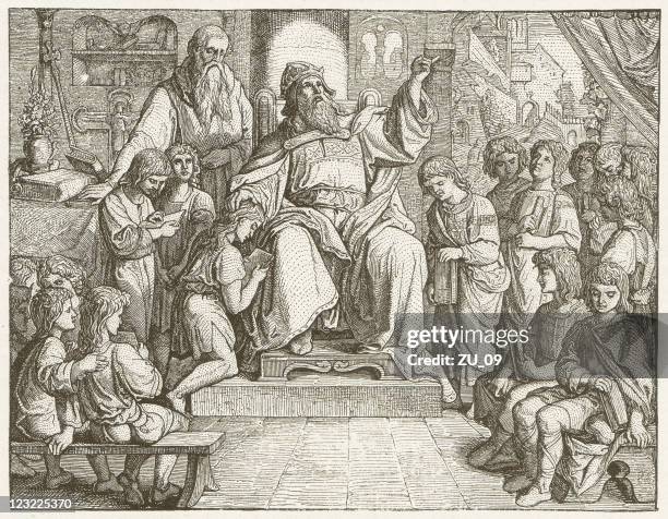 charlemagne (747-814) in his palace school, wood engraving, published 1881 - charlmange stock illustrations