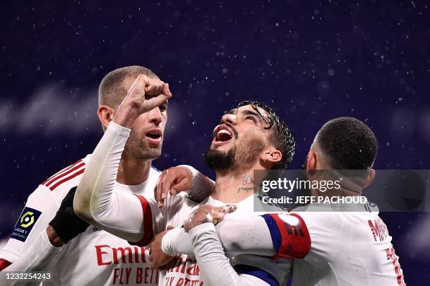 Lyon's Brazilian midfielder Lucas Paqueta celebrates after scoring a goal during the French L1 football match between Olympique Lyonnais and SCO...