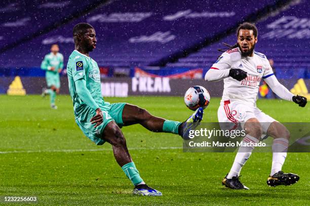 Mohamed Ali Cho of Angers plays against Jason Denayer of Olympique Lyon during the Ligue 1 match between Olympique Lyon and Angers SCO at Groupama...