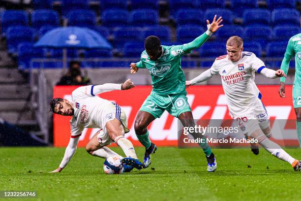 Mohamed Ali Cho of Angers battles for the ball with Lucas Paqueta of Olympique Lyon during the Ligue 1 match between Olympique Lyon and Angers SCO at...