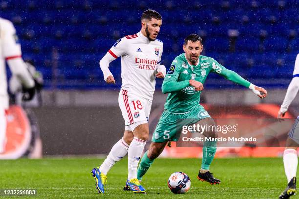 Mathis Cherki of Olympique Lyon plays against Thomas Mangani of Angers during the Ligue 1 match between Olympique Lyon and Angers SCO at Groupama...