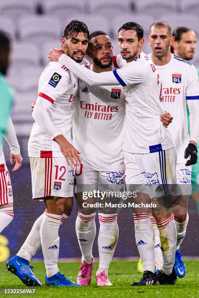 Memphis Depay of Olympique Lyon celebrating his goal with his teammates during the Ligue 1 match between Olympique Lyon and Angers SCO at Groupama...