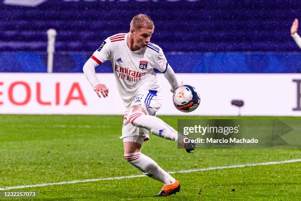 Melvin Bard of Olympique Lyon controls the ball during the Ligue 1 match between Olympique Lyon and Angers SCO at Groupama Stadium on April 11, 2021...