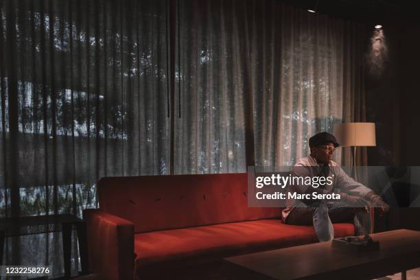 Former Carolina Panthers Quarterback Cam Newton poses for photos at his restraunt Fellaship on July 2, 2019 in Atlanta, Georgia.