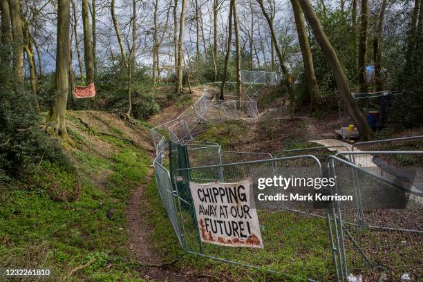 Banner hung on fencing by environmental activists is pictured during tree felling operations for the HS2 high-speed rail link in Jones Hill Wood,...