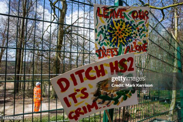 Signs placed on a fence by environmental activists are pictured during tree felling operations for the HS2 high-speed rail link in Jones Hill Wood on...