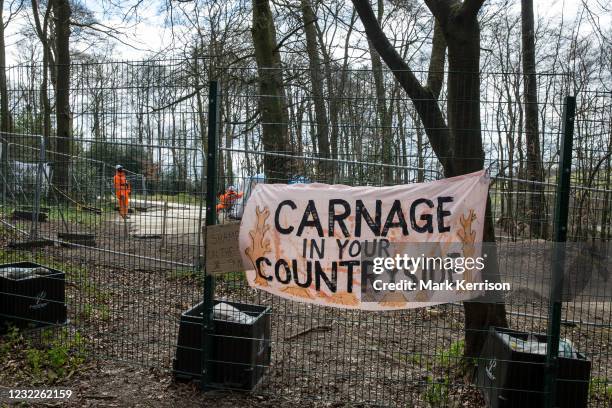 Banner hung from fencing by environmental activists is pictured during tree felling operations for the HS2 high-speed rail link in Jones Hill Wood on...
