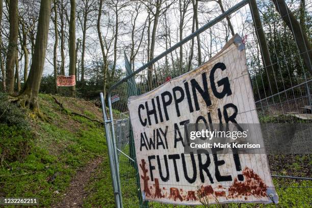 Banner hung on fencing by environmental activists is pictured during tree felling operations for the HS2 high-speed rail link in Jones Hill Wood on...