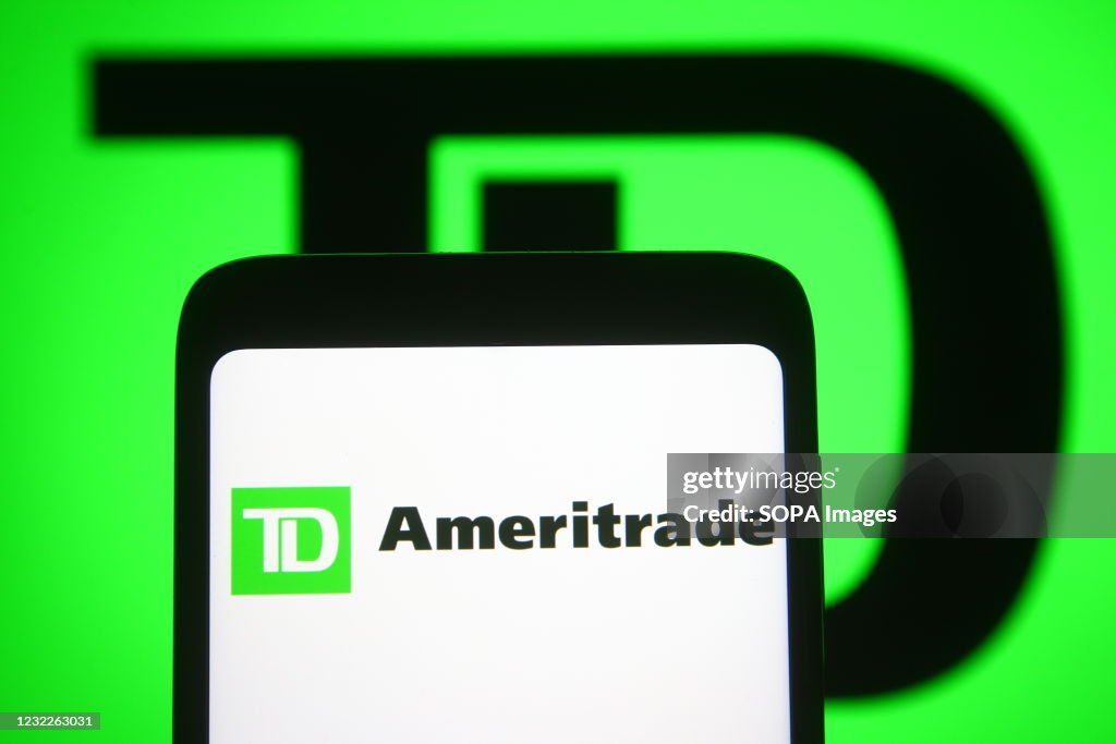 In this photo illustration a TD Ameritrade logo of a...