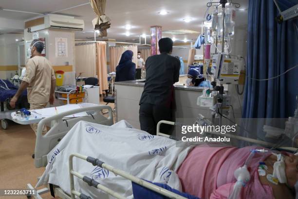 Medical workers are seen on duty at Rasoul Akram Hospital in Tehran, Iran on April 11, 2021. Iraniangovernment decided to spare budget for 13,000...