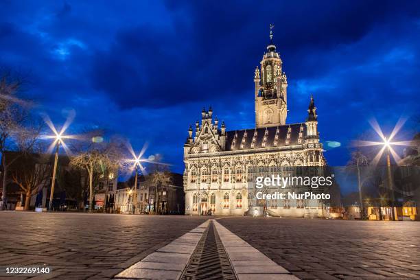 Illuminated iconic Middelburg Town Hall, one of the main monument attractions of the city sightseeing, a landmark of architecture as seen after the...