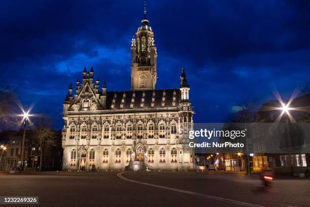 Illuminated iconic Middelburg Town Hall, one of the main monument attractions of the city sightseeing, a landmark of architecture as seen after the...