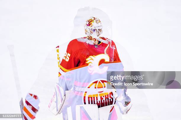 Calgary Flames Goalie Jacob Markstrom and Edmonton Oilers Goalie Mike Smith look on between whistles in an in camera multiple exposure photo taken...