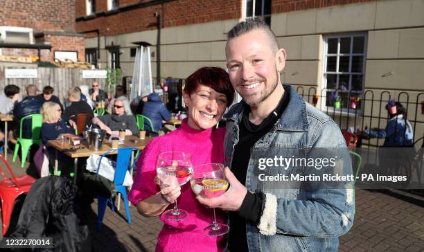 Bar owners Adam Rickitt and wife Katy welcome back customers to the Dexter and Jones gin bar in Knutsford, Cheshire, as England takes another step...