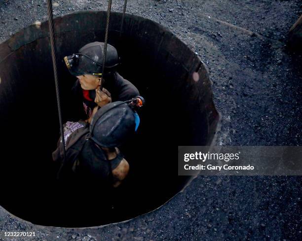 Miners are hoisted out of a coal mine on Thursday, March 25, 2021 in Sabinas, Coahuila. Mexico once embraced renewable energies. Now President Andres...