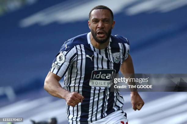 West Bromwich Albion's English-born Scottish midfielder Matt Phillips celebrates after scoring their second goal during the English Premier League...