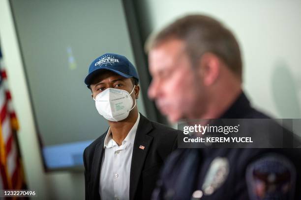 Mike Elliott , the new mayor of Brooklyn Center looks to Tim Gannon, Brooklyn Center Police Chief during press conferance at the Brooklyn Center...