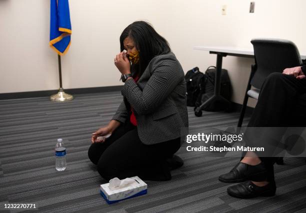 Brooklyn Center city council member Marquita Butler reacts after viewing the body camera footage of the killing of 20-year-old Daunte Wright after it...