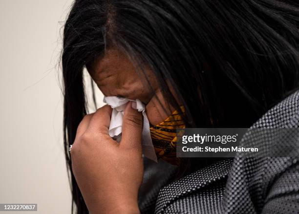 Brooklyn Center city council member Marquita Butler reacts after viewing the body camera footage of the killing of 20-year-old Daunte Wright after it...