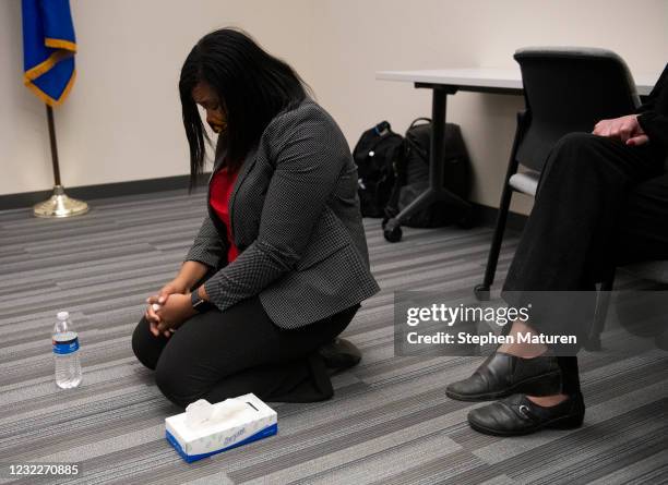 Brooklyn Center city council member Marquita Butler reacts after viewing the body camera footage of the killing of 20-year-old Daunte Wright after it...