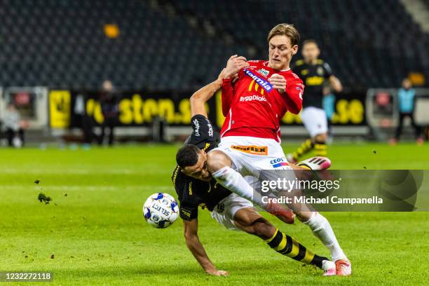 Nabil Bahoui of AIK is injured in a challenge with Gustav Granath of Degerfors IF during an Allsvenskan match between AIK and Degerfors IF at Friends...