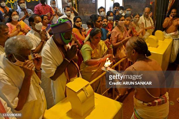 Hindu devotees visit the Tirumala Tirupati Devasthanams temple on the occasion of 'Ugadi' festival or new year's day as per the Hindu lunisolar...