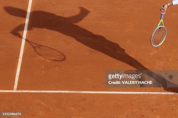 Italy's Matteo Berrettini serves to Spain's Alejandro Davidovich Fokina during their second round singles match on day three of the Monte-Carlo ATP...