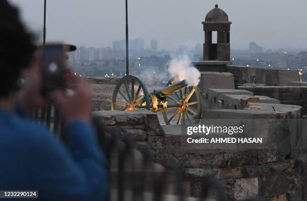 Ramadan cannon is fired to mark the breaking of the fasting during the Muslim holy month of Ramadan at the compound of the citadel in the Egyptian...