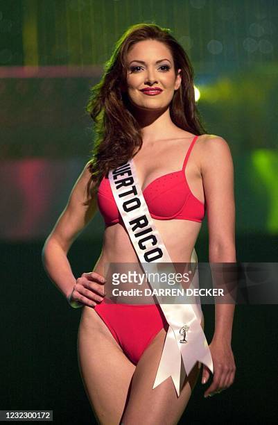 Denise M. Quinones August, Miss Puerto Rico 2001, competes in her Bluepoint Swim swimsuit during the Miss Universe 2001 Presentation Show at the...