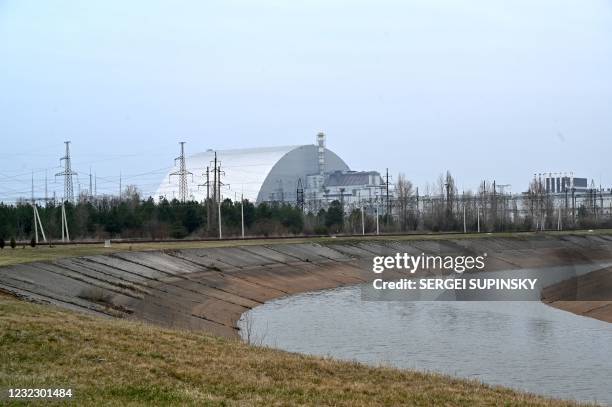 Picture taken on April 13, 2021 shows the giant protective dome built over the sarcophagus covering the destroyed fourth reactor of the Chernobyl...