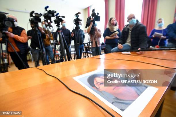 This photograph shows the portrait of missing child Mia Montemaggi put on a table during a press conference at The Epinal Courthouse in Epinal,...